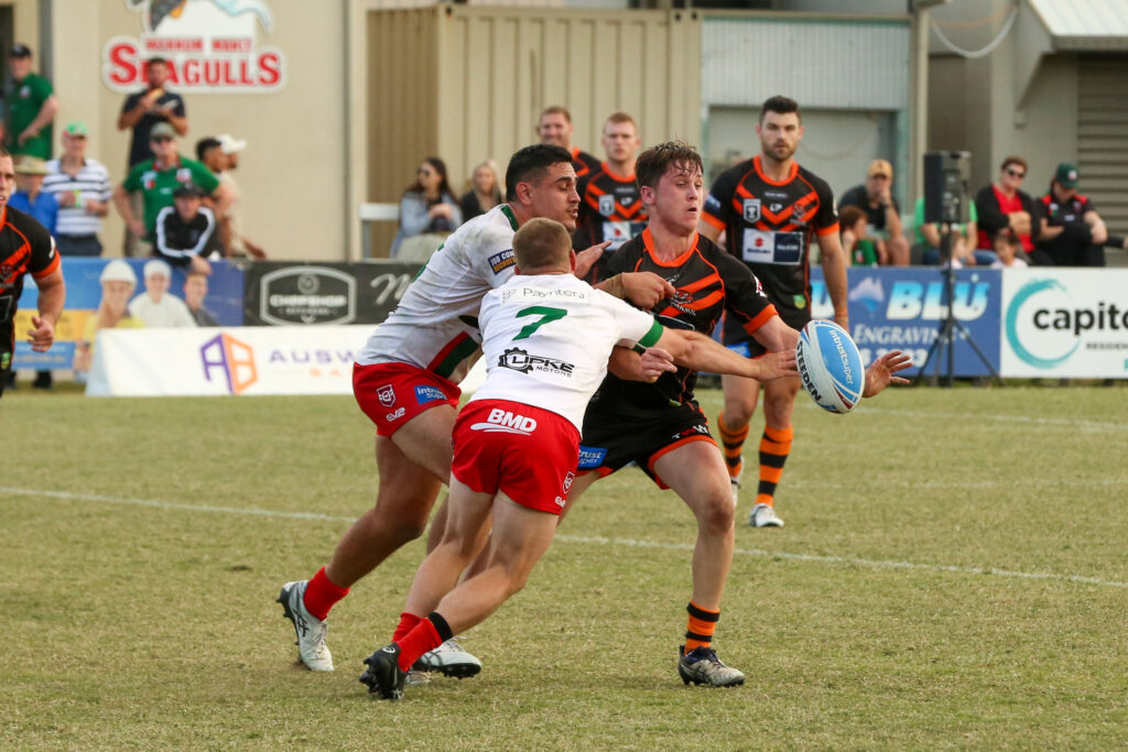 Ollie Pascoe passing the ball.  Photo by Jorja Brinums/QRL