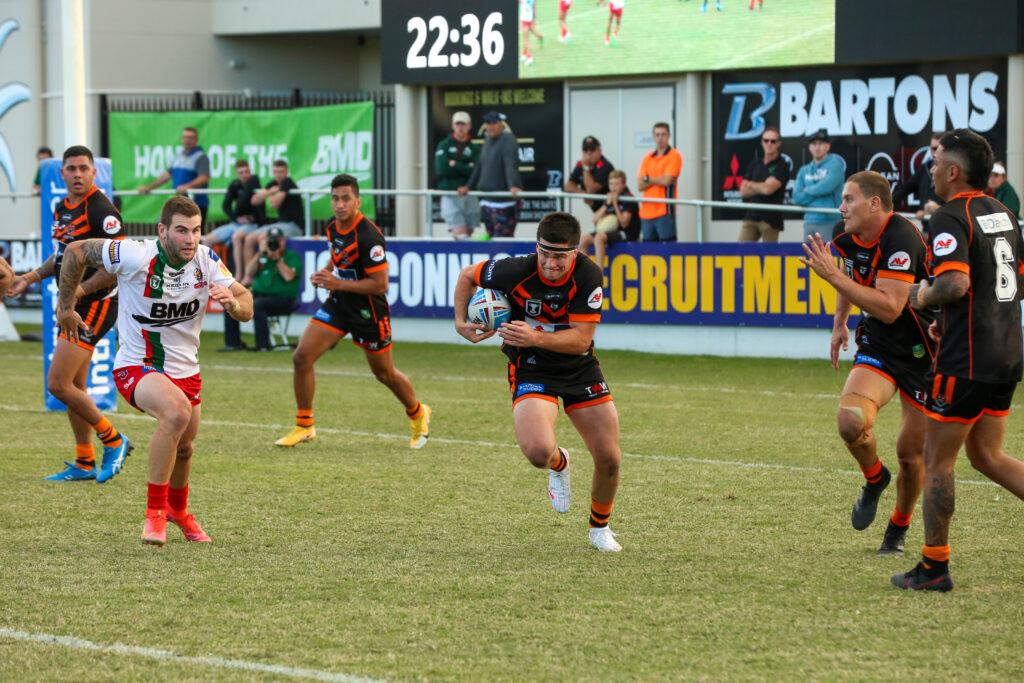 Dan Atkinson with the ball.  Photo by Jorja Brinums/QRL